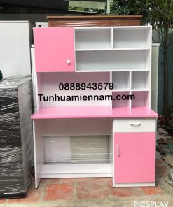 Bàn học sinh nhựa màu trắng hồng có giá sách và ngăn kéo