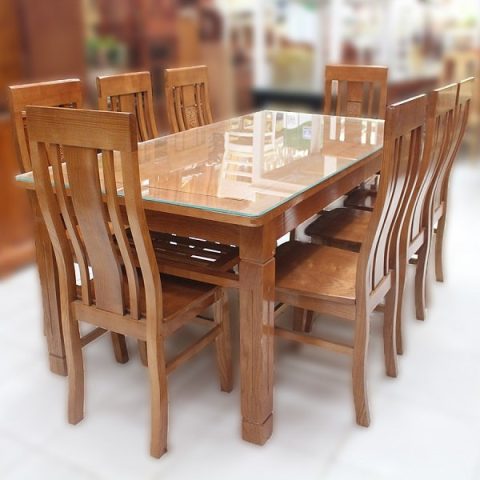 Bộ bàn ăn 8 ghế gỗ xoan đào với thiết kế thanh lịch, mặt bàn gỗ tự nhiên vân đẹp.