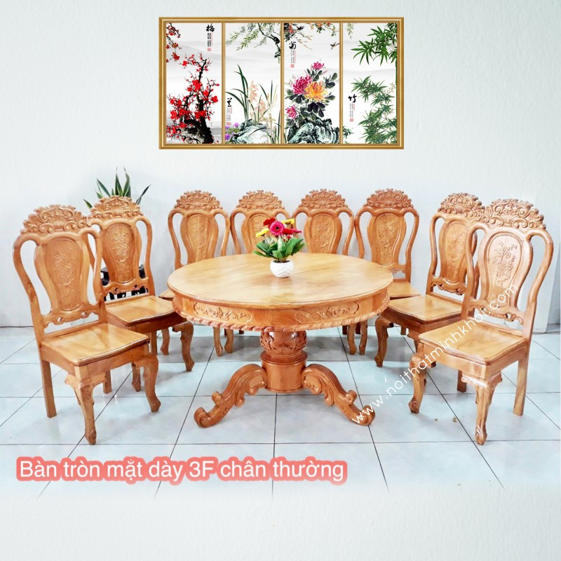 Bộ bàn ăn tròn bằng gỗ tự nhiên 8 ghế với thiết kế chạm khắc tinh xảo, thể hiện sự đẳng cấp