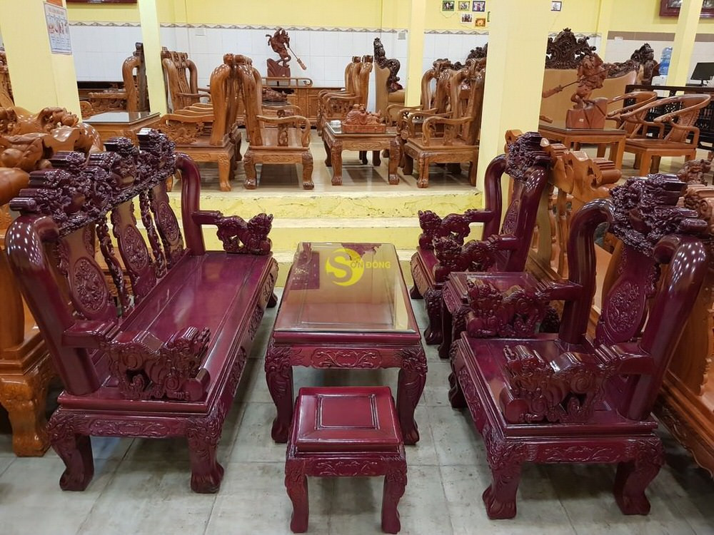 Bộ bàn ghế gỗ Cẩm Tím chạm Kỳ Lân tay 12 độc đáo