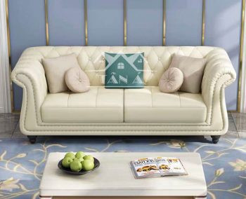 Bộ sofa tân cổ điển với khung gỗ chạm khắc tinh xảo và bọc da màu kem