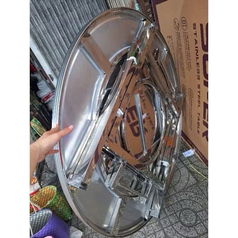 chất lượng bàn ăn inox tròn xoay