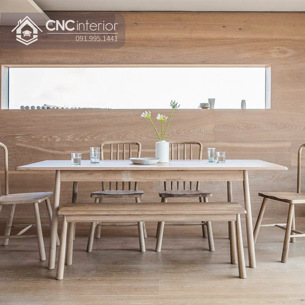 Góc nhìn cận cảnh bộ bàn ăn gỗ tối giản, hài hòa với không gian