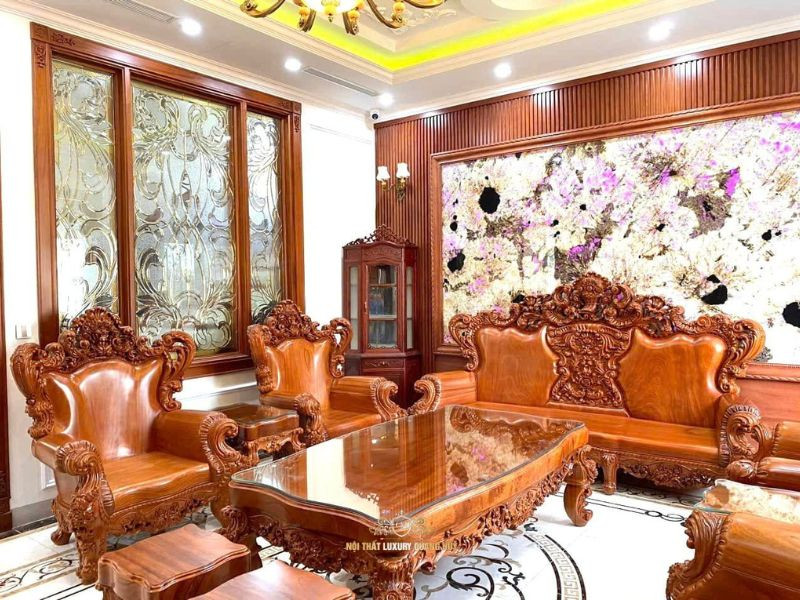 Tổng quan về bộ bàn ghế hoàng gia gỗ gõ đỏ nguyên khối và các yếu tố giá thành