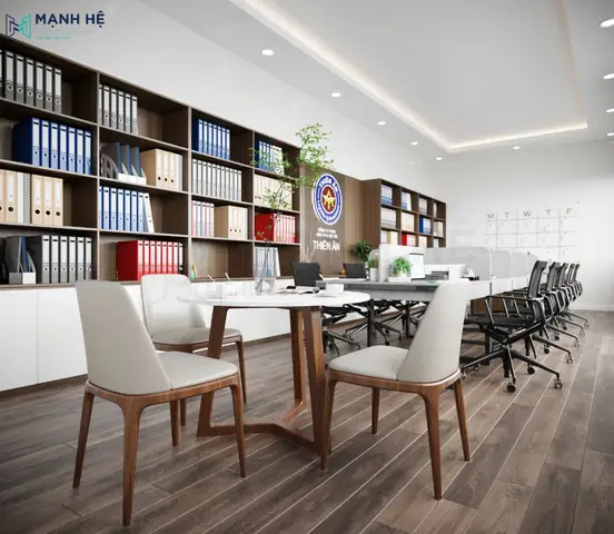 Bàn Tiếp Khách Được Bố Trí Ở Cuối Văn Phòng Cạnh Khu Vực Làm Việc Của Nhân Viên