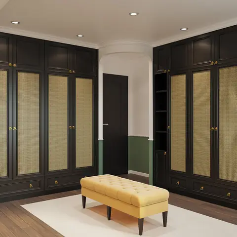 Hệ Thống Tủ Cao Kịch Trần Cung Cấp Không Gian Lưu Trữ Thoải Mái. Ghế Nệm Màu Vàng Ở Trung Tâm Tựa Như Một Điểm Nhấn Nghệ Thuật.