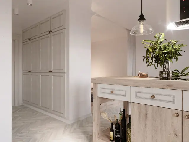 Một chiếc gương thủ công tô điểm cho khu vực phía trên một đơn vị vanity bê tông trắng.