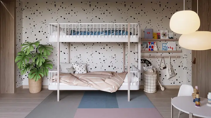 Một chiếc gương thủ công tô điểm cho khu vực phía trên một đơn vị vanity bê tông trắng.