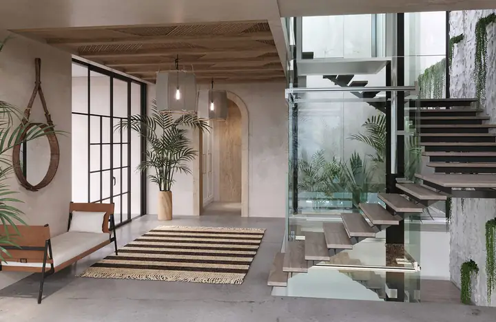 Một chiếc gương thủ công tô điểm cho khu vực phía trên một đơn vị vanity bê tông trắng.
